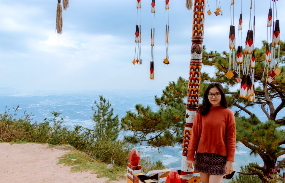 Woman Wearing Maroon Long-sleeved Shirt And Brown Mini Skirt