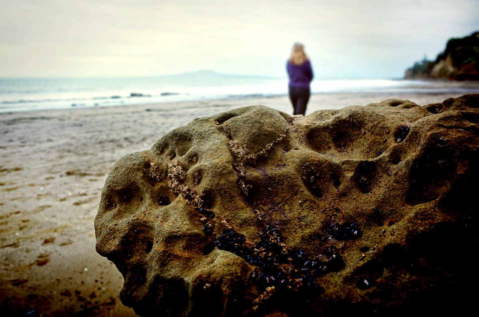 Woman Walking On Shore