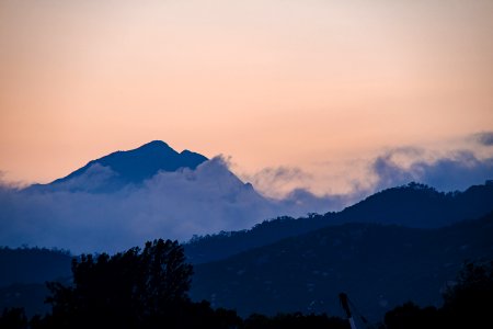 Silhouette Of Mountain During Sunset photo