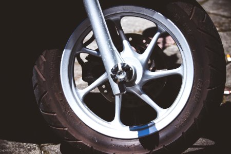 Silver Motorcycle Rim And Tire photo