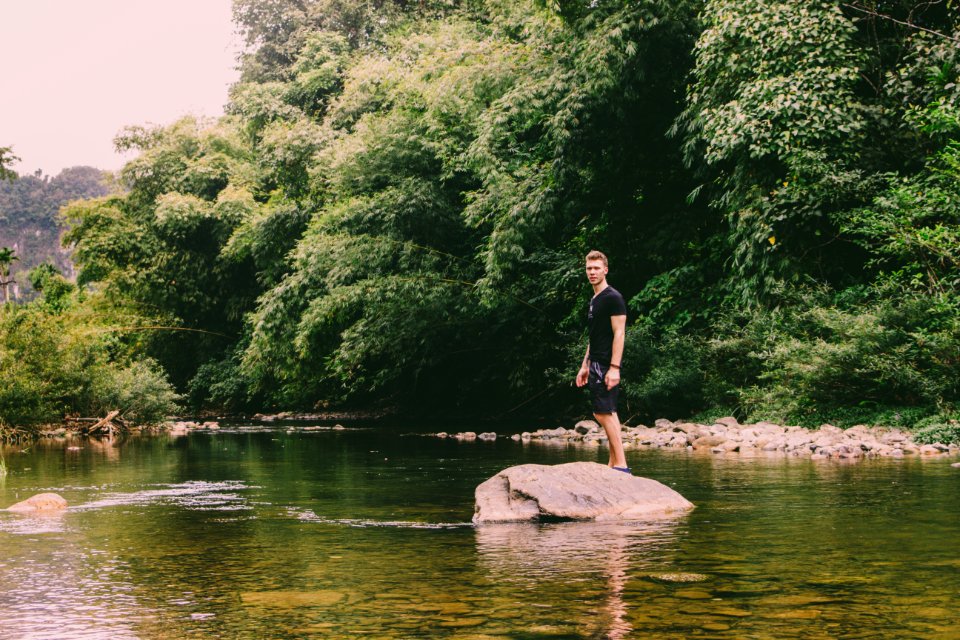 Man Standing On Rock