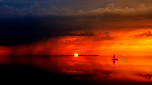 Sailboat On Body Of Water At Daytime photo