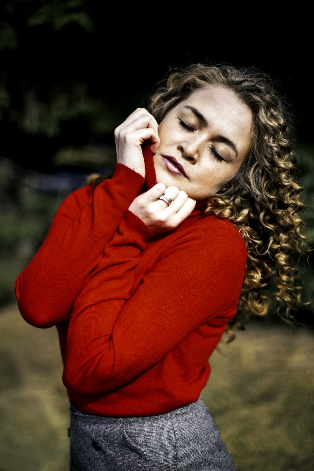 Woman Wearing Red Long-sleeved Top