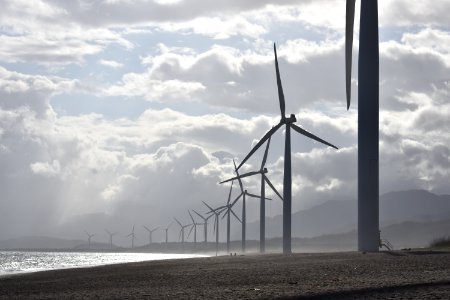 Windmills On Seashore Under White Clouds photo