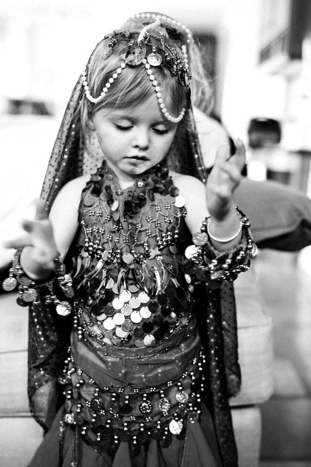 Grayscale Photo Of Girl Wearing Traditional Dress photo