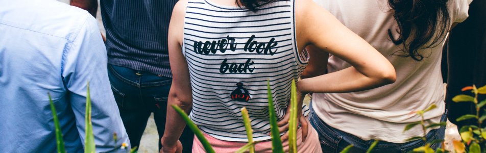 Person Wearing White And Black Striped Sleeveless Top photo