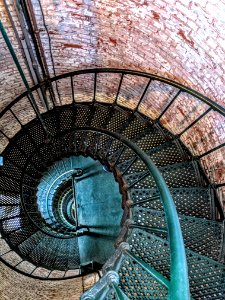 Top View Of Green Metal Spiral Staircase photo