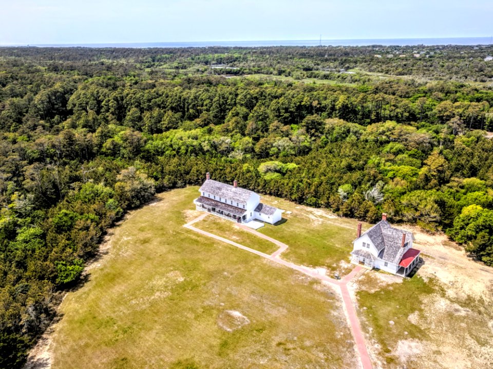 Aerial Photography Of Two Houses Surrounded With Plants And Trees