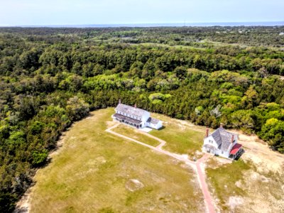 Aerial Photography Of Two Houses Surrounded With Plants And Trees photo