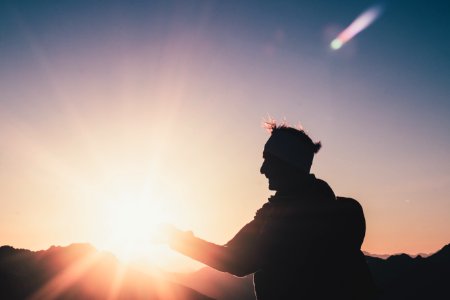 Silhouette Of Man During Sunset photo