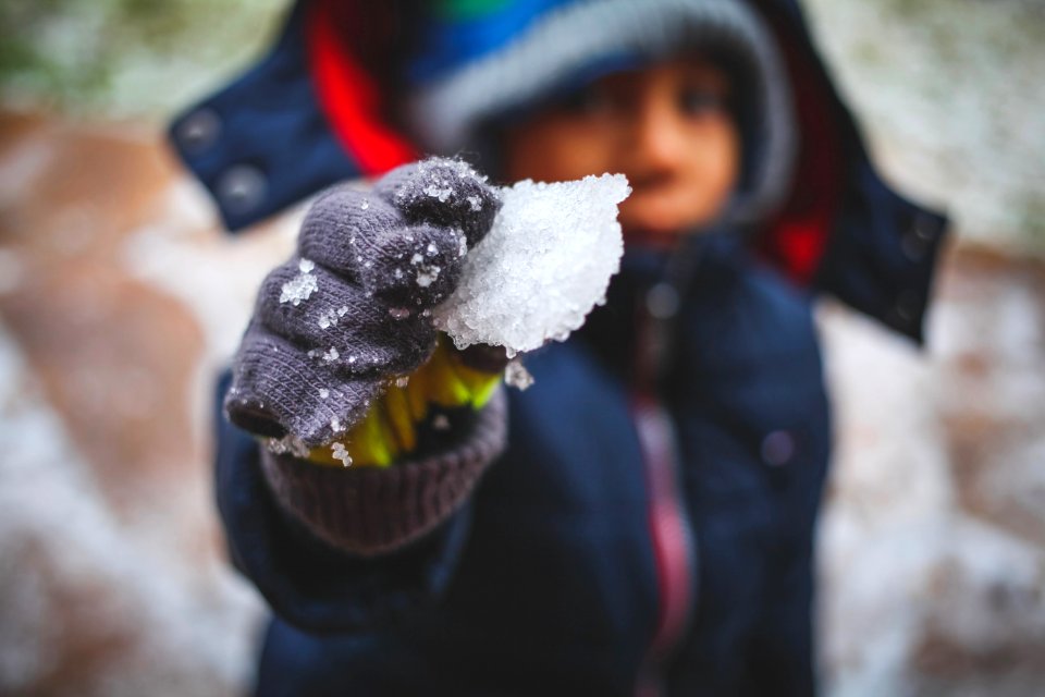 Person Holding Ice Shard