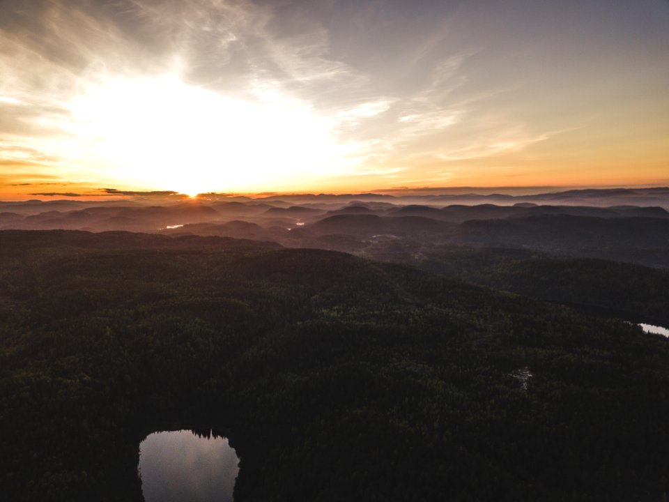 Aerial Photo Of Mountains During Sunset