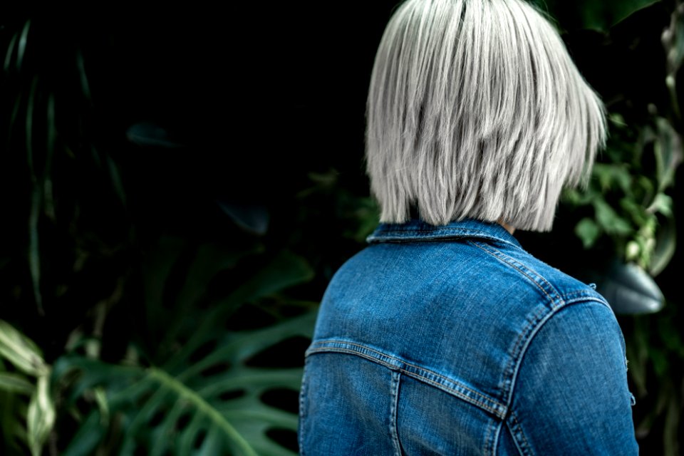 Person Wearing Blue Denim Jacket