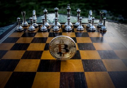 Close-up Photography Of Coin On Chessboard photo