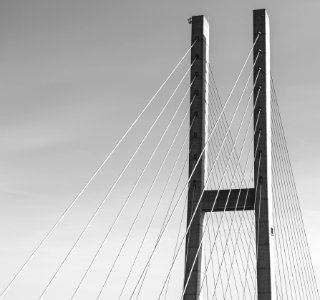Gray Concrete Bridge In Grayscale Photography photo