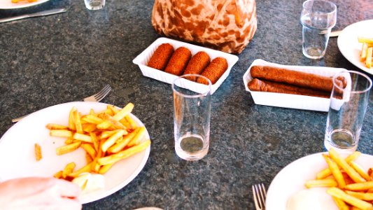 Photography Of French Fries And Hotdogs photo