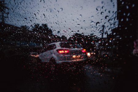 Silver Suv On Asphalt Road During Rain photo