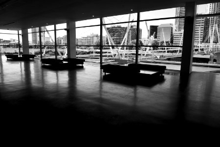 Three Couches In Hallway In Grayscale Photography