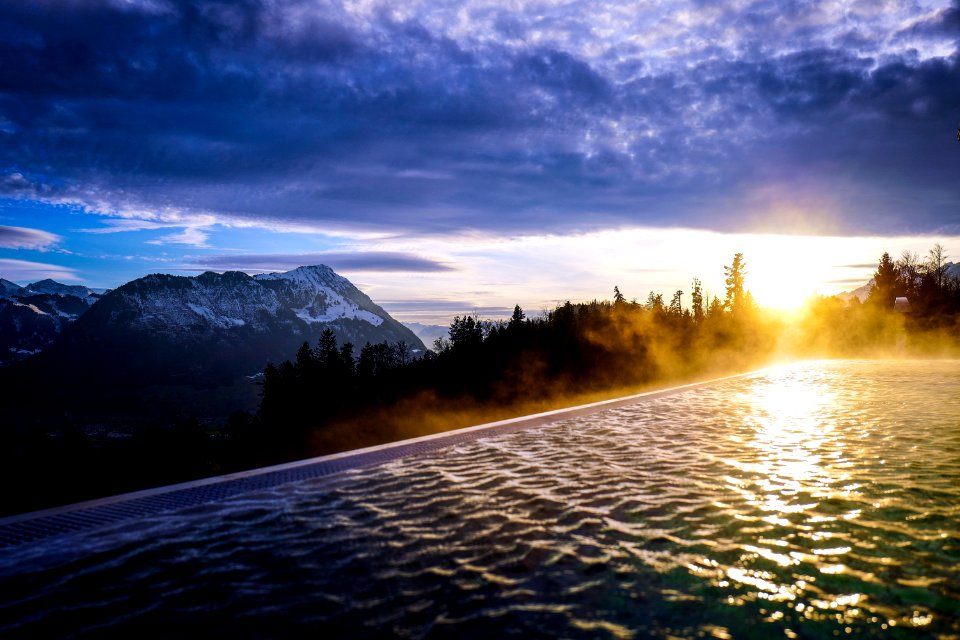Infinity Pool Near The Forest During Golden Hour