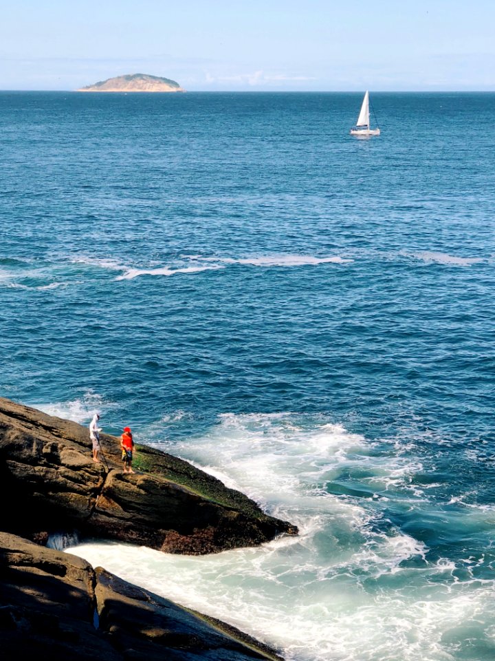 White Sailboat On Body Of Water