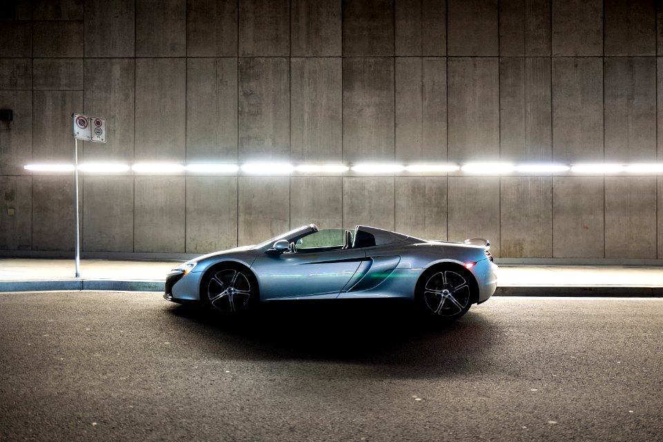 Silver Mclaren 650s Convertible Coupe On Gray Concrete Road