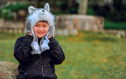 Toddlers Wearing Wolf Headgear photo