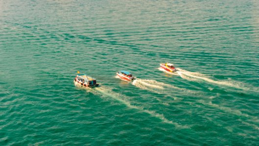 Three Speedboats Aerial Photography photo
