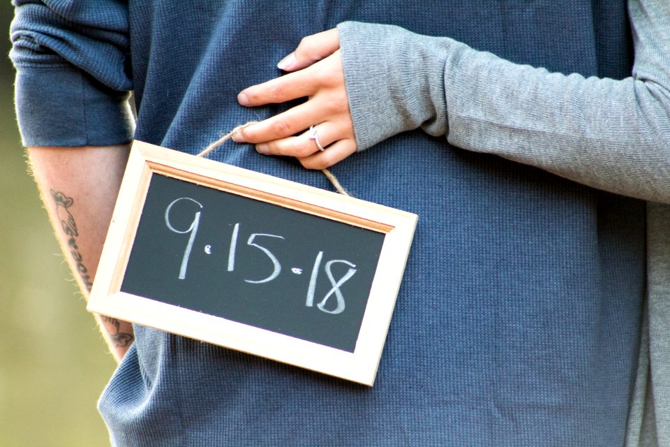 Person Holding 9-15-18 Signage