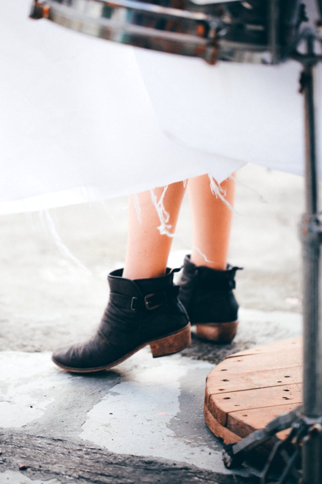Person In Black Shoes Standing