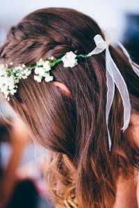 Selective Focus Photo Of Woman Wearing Floral Headdress photo