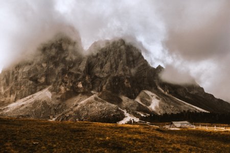 Gray House Under Gray And White Volcanos Foot photo