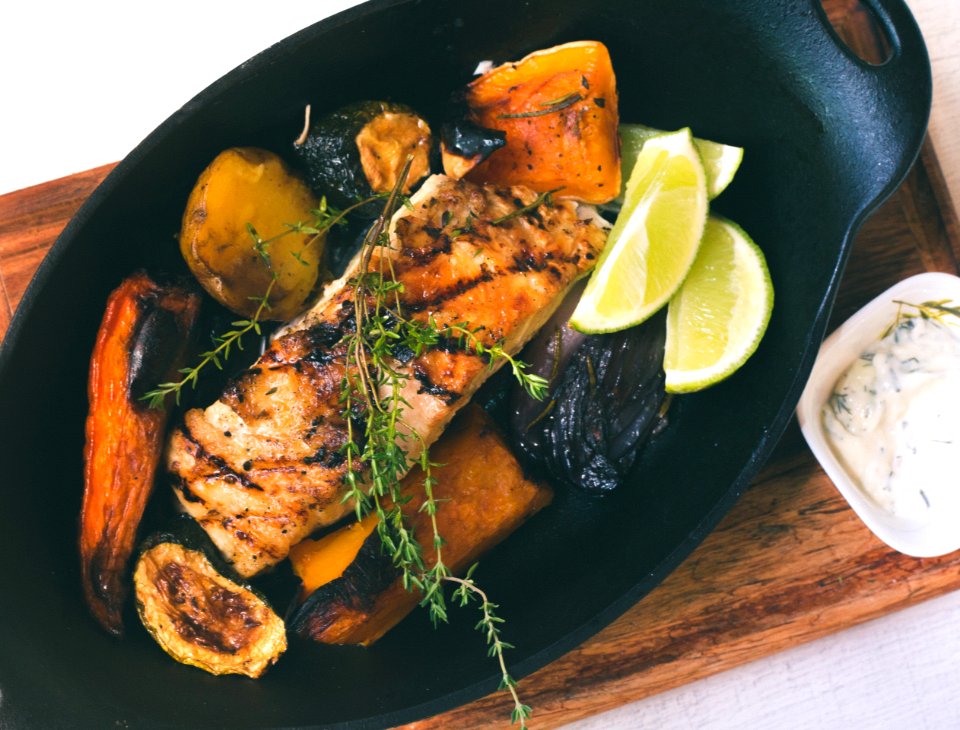 Grilled Meat On Black Sizzling Tray