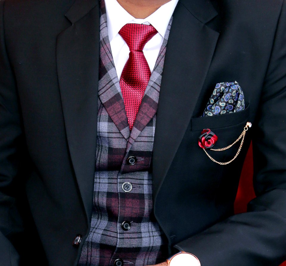 Man Wearing Black Notched Lapel Suit Jacket photo