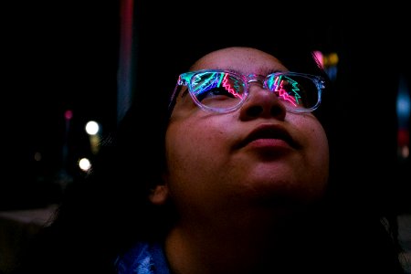 Woman Wearing Eyeglasses During Nighttime photo