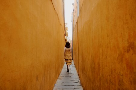 Photo Of Woman Walk Through Pathway