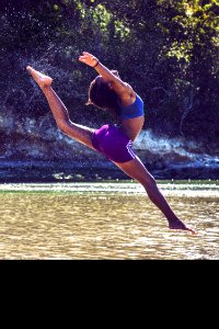 Woman Jump On Body Of Water