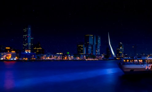 City Skyline Under Clear Sky During Nighttime photo