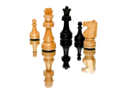 Photo Of Black And Beige Wooden Chess Pieces With White Background