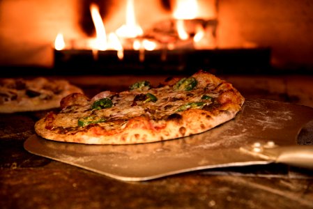 Baked Pizza On Pizza Peel In Oven