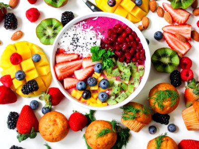 Assorted Sliced Fruits In White Ceramic Bowl
