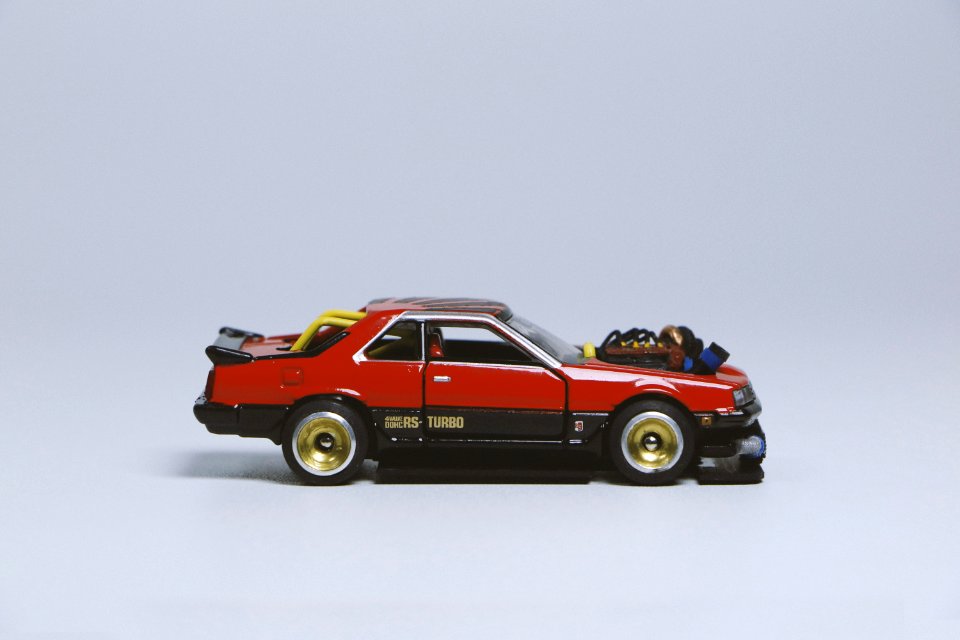Red And Black Die-cast Car