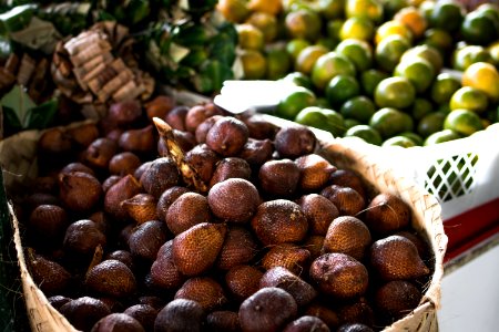 Pile Of Brown Fruit With Brown Basket