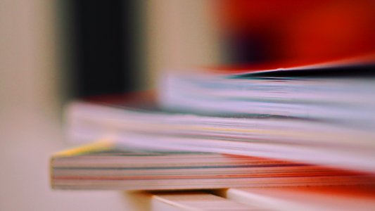 Selective Focus Photo Of Thick Books