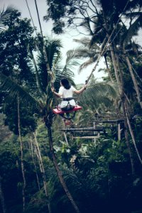 Girl Riding Swing photo