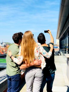 Three Person Doing Selfie Under Sunny Sky