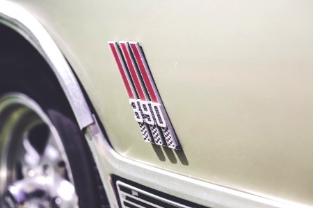 Close-Up Photography Of Car Emblem