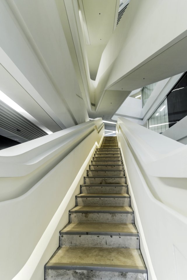 Brown And Gray Stairs With White Rails