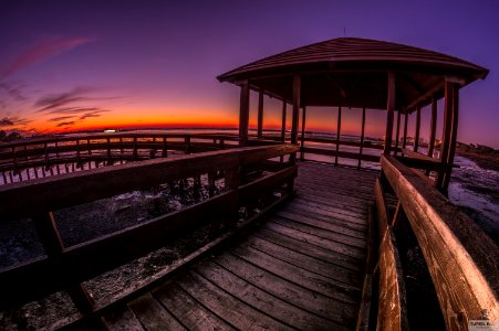 Brown Wooden Pagoda Under Golden Sky photo