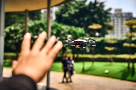 Focus Photography Of Drone Flying