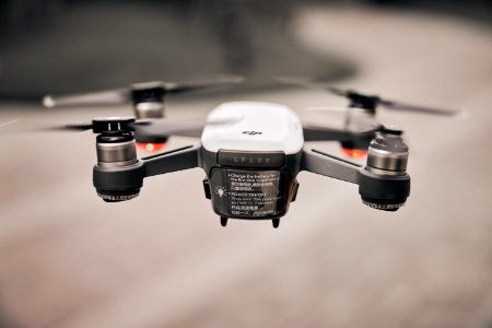Flying White Drone Tilt Shift Lens Photography photo